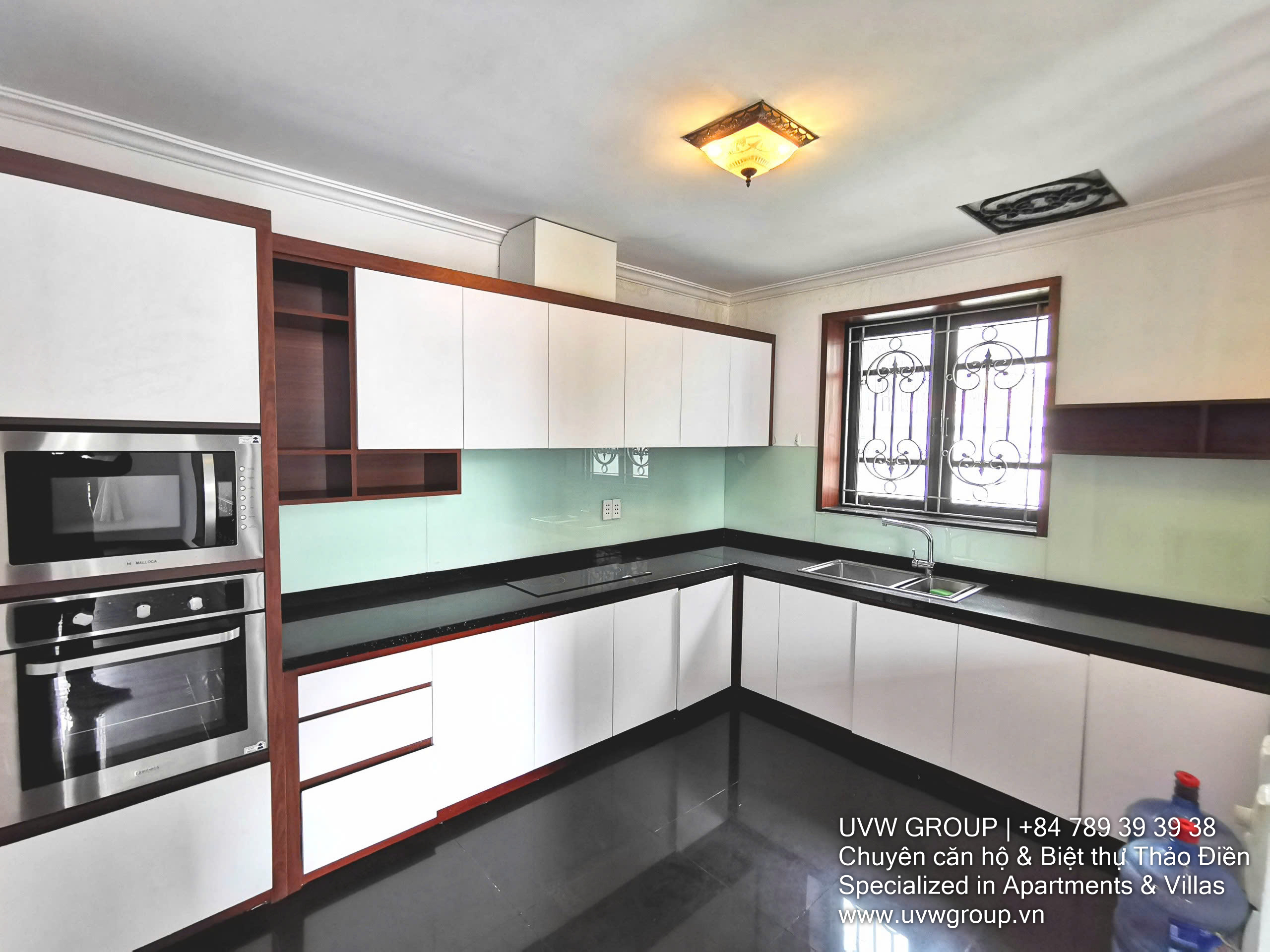 3-bedroom villa for rent in An Phu, District 2 with garden, modern kitchen, and secure compound